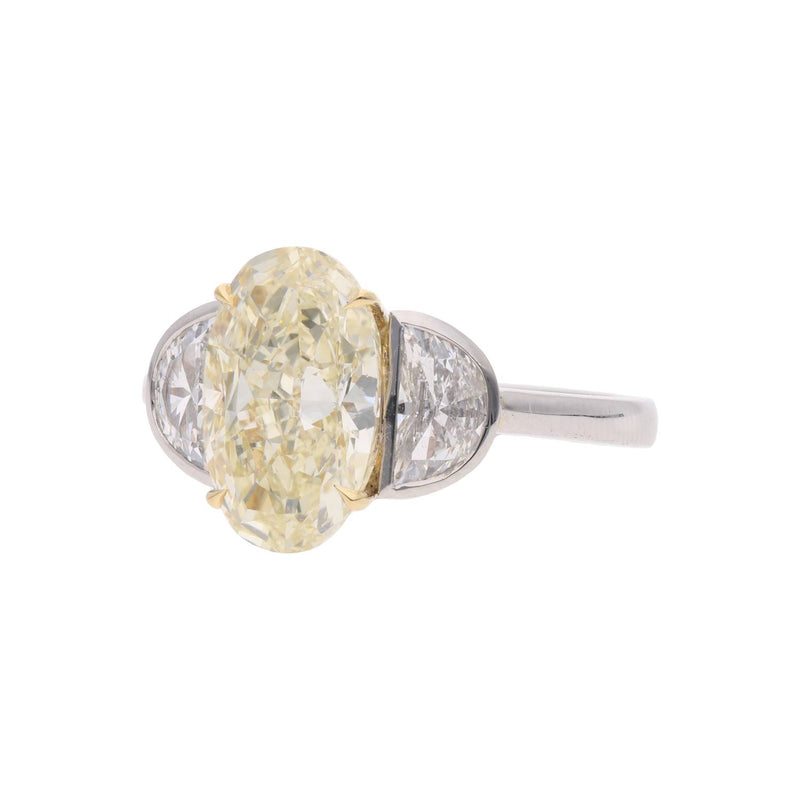 Platinum Oval Yellow and White Diamond Three Stone