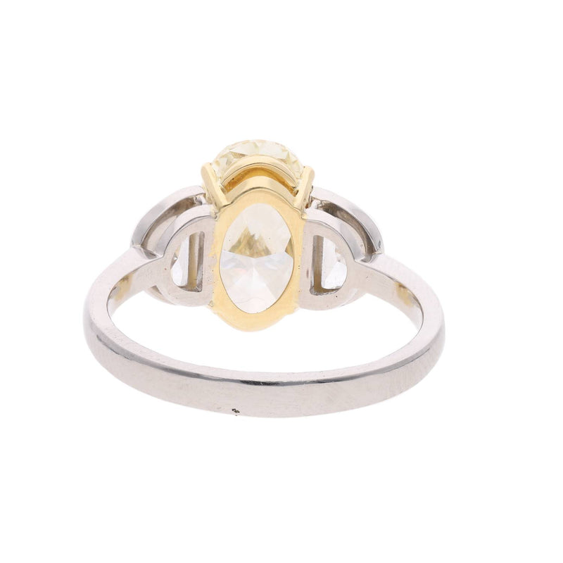 Platinum Oval Yellow and White Diamond Three Stone