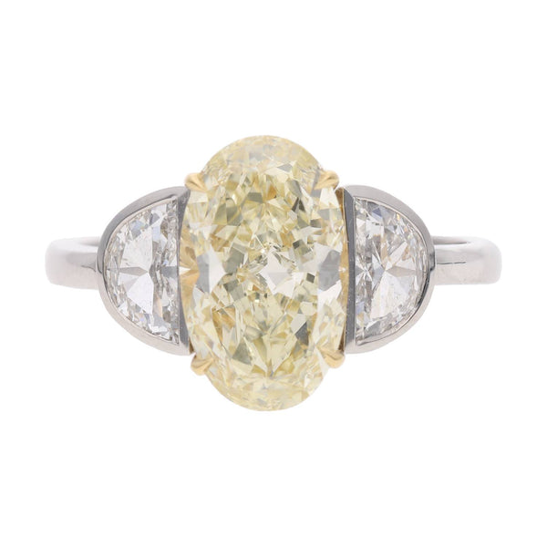 Platinum Oval Yellow and White Diamond Three Stone