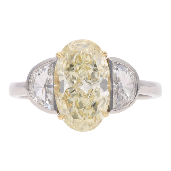 Platinum Oval Yellow and White Diamond Three Stone