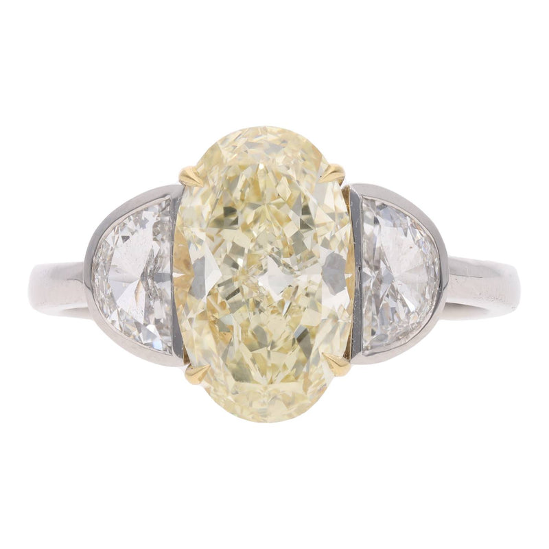 Platinum Oval Yellow and White Diamond Three Stone