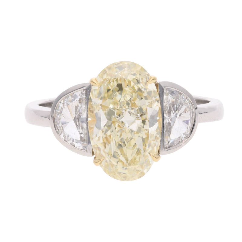 Platinum Oval Yellow and White Diamond Three Stone